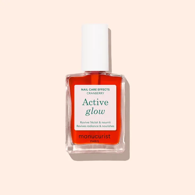 manucurist-active-glow-cranberry-pflegender-glow-nagellack-koralle image 1